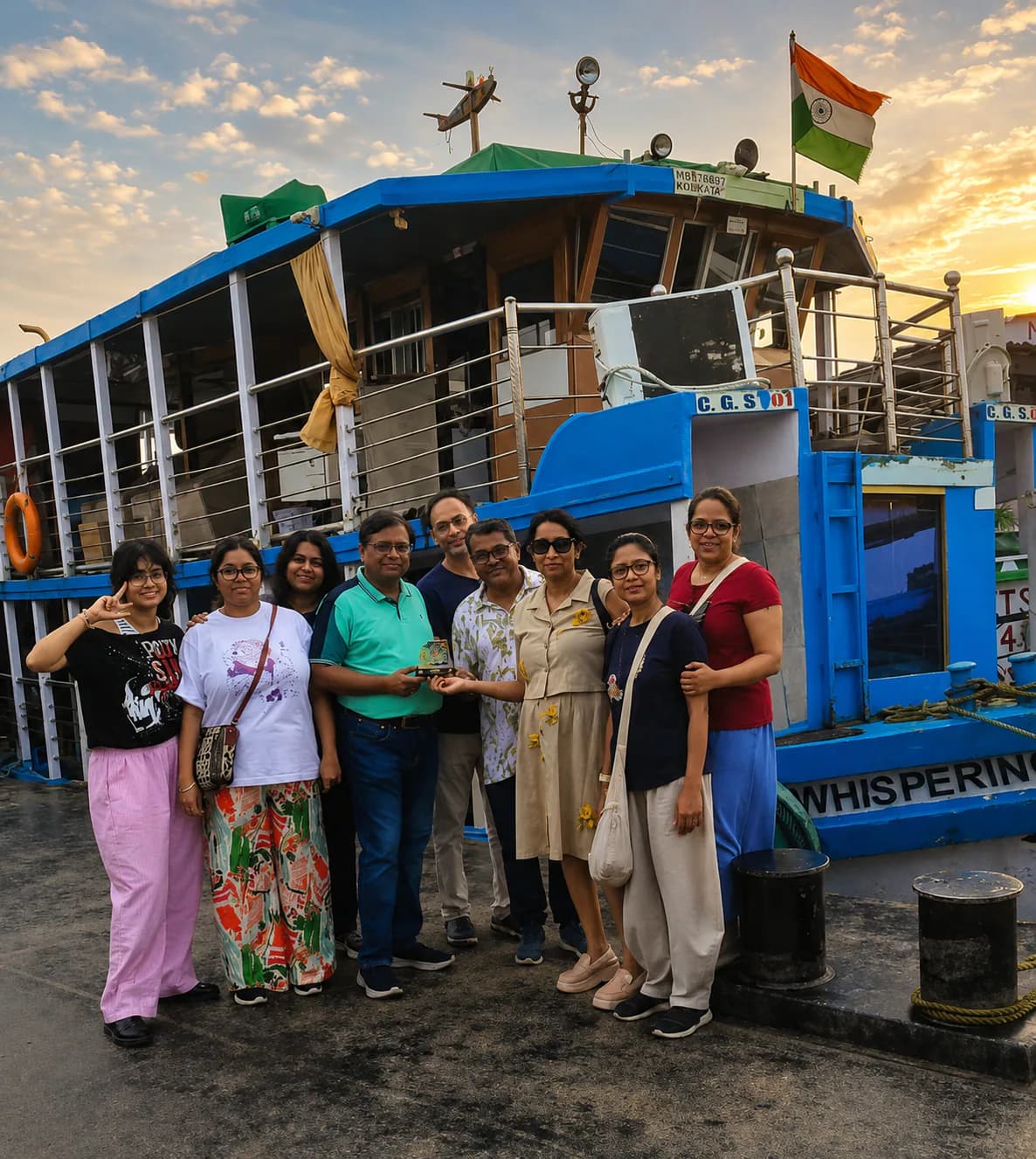Guests standing near Whispering Winds after deboarding the houseboat