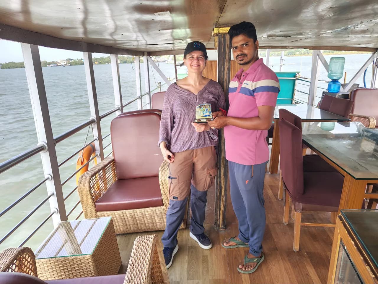 Solo woman traveller aboard Whispering Winds with a crew member