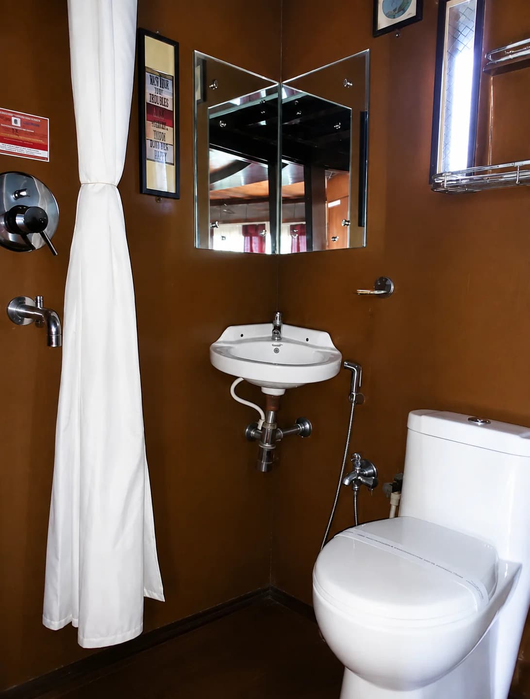 Attached bathroom inside a cabin aboard Whispering Winds
