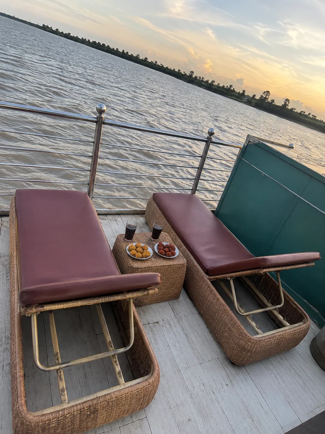 Recliners with evening refreshments on the deck of Whispering Winds