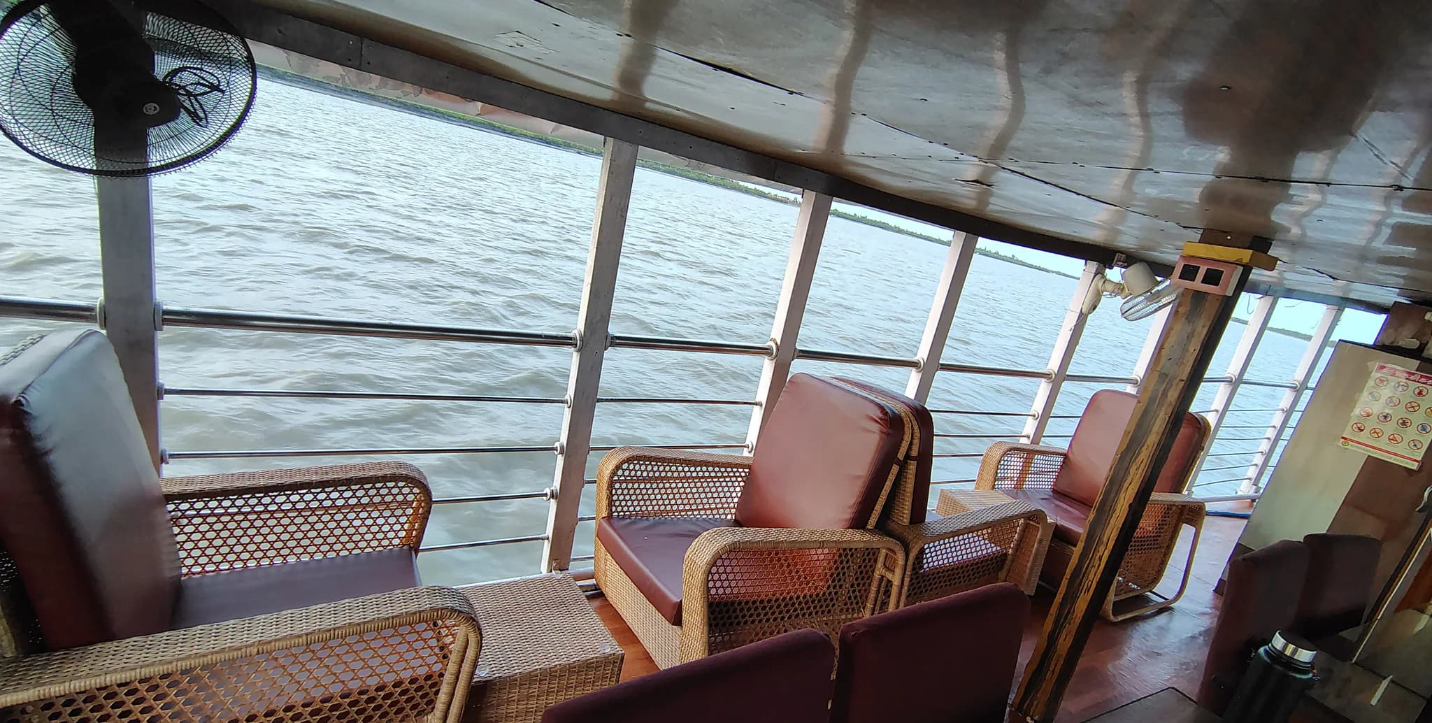 River-facing common seating area aboard Whispering Winds